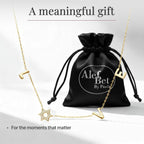 LOVE WITH A JEWISH STAR IN GOLD: The word LOVE is spelled out in warm yellow gold script letter charms where the letter O is replaced by a Star of David set with cubic zirconia, a clever and beautiful
